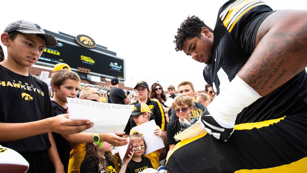 Iowa Hawkeyes fan guide to "Kids' Day at Kinnick" on Saturday, August 13